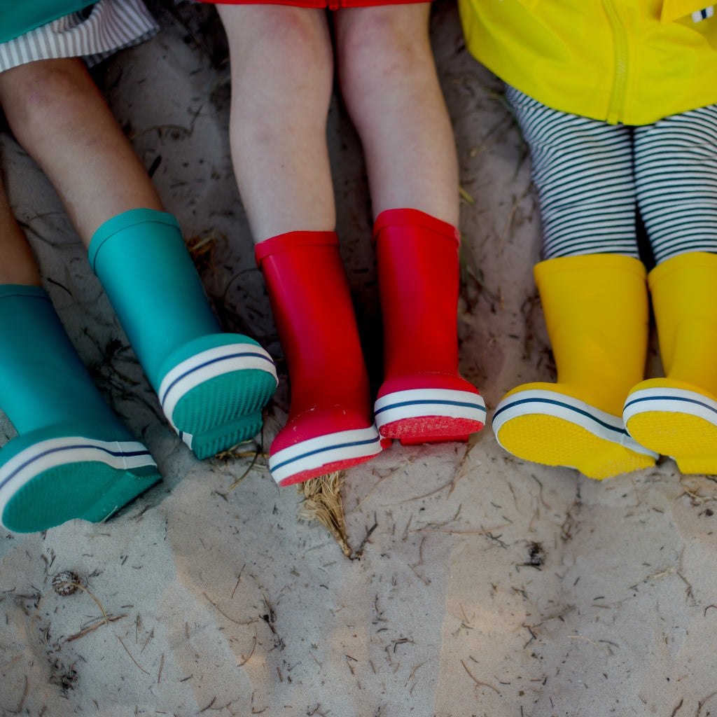 Colourful Kids Wellies at the beach