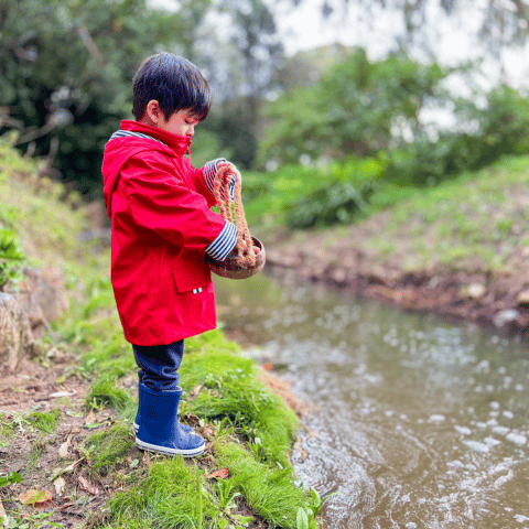 Kids Red raincoat and navy gumboot bundle